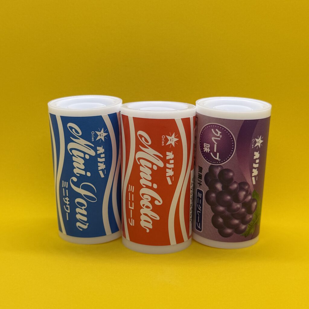 Orion Mini Cola candy.